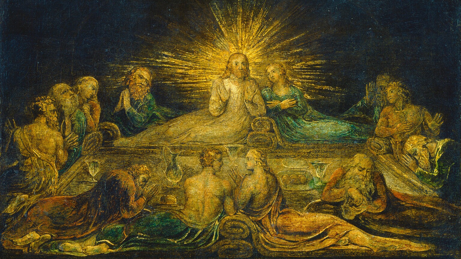 A long, rectangular dining table is surrounded by thirteen people in this horizontal painting. The skin of all the people, some of their clothing, and the tabletop are painted golden yellow. Touches of aquamarine blue, salmon pink, and rust red appear in some clothing, and the scene is set against a nearly black background. Across from us at the center of the table, a radiating, gold starburst surrounds the head and shoulders of a man, Jesus, with shoulder-length blond hair and beard. He looks at or toward us with dark eyes as he holds his hands up, palms facing out, at his chest. He wears a champagne-white robe and reclines with his legs extended to our left as he rests his opposite elbow on what could be a cushion or rolled-up blanket. To our right, a second person mirrors Jesus’s reclining position but with wrists crossed over the chest and turning to look toward Jesus. That person wears a long teal-blue garment and has smooth cheeks and long blond hair. Another bearded man to our left, near the back corner of the table, leans away from Jesus with hands held up as if in prayer. Three people lounge or sit on each of the short sides of the table to our left and right, and four recline on the side closest to us. Some have beards and others are cleanshaven, and some have short hair while others have long locks. Most of them look toward Jesus while two bend low to the table in prayer. One man, in the lower right, wears brick red and turns his back on the table as he counts or touches coins in a sack. The long table is set with goblets and plates of food. The artist signed the work with his initials in the lower left corner: “WB inv.”
