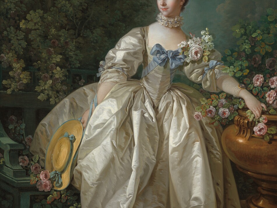 A young woman with light skin stands in a garden, wearing a voluminous, full-length, silvery, shimmering gown in this vertical portrait painting. Her body faces us, as she looks into the distance to our left. She has rosy cheeks, gray-green eyes under gently arched, light brown brows, and her coral-pink, thin, closed lips curve in a slight smile. Her ash-brown hair is pulled back and adorned with tiny shell-pink and azure-blue flowers along the left side top of head, to our right. A pleated lace ruffle encircles her smooth neck. Her gown is parchment white where the light glints off the stiff fabric and is silvery gray in the shadows, creating a silk-like sheen. The dress is cut low across the chest, fits tightly around her narrow waist, and has puffy sleeves tied at the elbows with topaz-blue bows. Another blue bow is tied at her chest, and the ends wrap around her back along her waist. A corsage at her left shoulder, to our right, is a profusion of white flowers around a pale pink rose. In her other hand, to our left, she holds a straw hat with a shallow crown and a wide brim, trimmed with sky-blue ribbon. The arm holding the hat is nearly engulfed in the deep folds of her full skirt. She holds a pink rose in her other hand, which rests on the lip of a shiny, copper-colored urn filled with pink flowers and delicate green leaves. On that wrist she wears a bracelet with four strands of white pearls holding a cameo. She stands on a pale, dirt ground. A teal-blue bench in the lower left corner of the painting is tucked into sage-green shrubbery. Sprigs of pink roses are strewn across the seat and on the ground. The woman is framed to either side with olive and celery-green trees and vegetation, which blend into the hazy distance beyond her head.