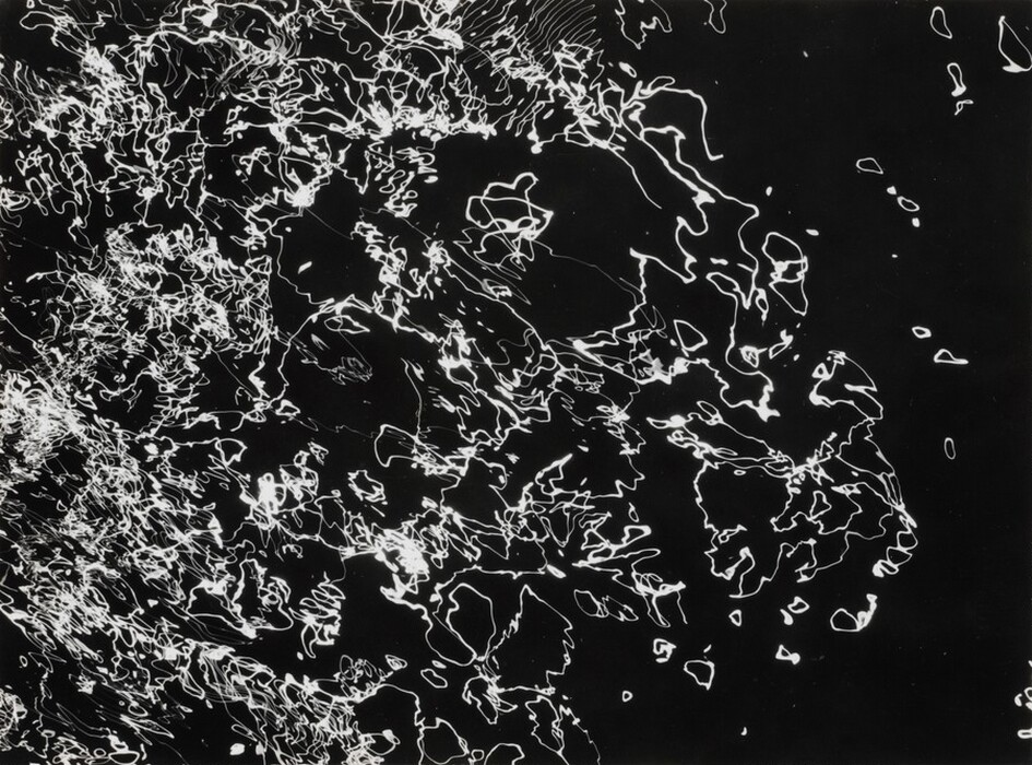 The image features white wavy lines and shapes on a dark background. The lines create a sense of movement and form intricate patterns.
