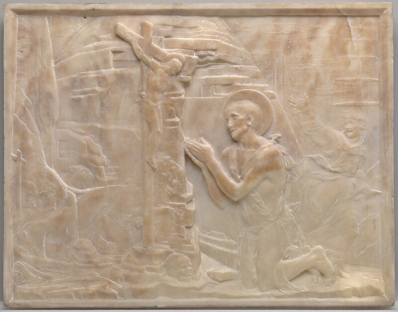 A man wearing a cloak tied around his body kneels with his hands together at the foot of a crucifix, set against a rocky outcropping on this stone panel. The scene is shallowly carved in low relief from pale, apricot-peach marble. Both the kneeling man, Saint Jerome, and the man hanging on the cross have raised, disk-like halos. Slightly right of center, the kneeling man looks up at the cross from under heavy brows. He has hollow cheekbones and short hair. His robe is tied over his shoulders and falls across his hips, but his feet and slender arms are bare. The man on the cross is smaller in scale, less than half the size of Saint Jerome. He hangs heavily from his hands, which are nailed into the cross, and his head falls forward. He is nude except for a loincloth across his hips. A rocky, hut-like form fills the space behind Saint Jerome. A few details are lightly carved so are visible only on closer inspection. These include a smaller cross along the left edge of the panel and a skull at the base of the crucifix. Between the crucifix and rocky structure, a male and female lion run toward Saint Jerome, mouths open. In the space between Saint Jerome and the right edge of the panel, another person is lightly carved into the background. He runs to our right while looking back over one shoulder, perhaps at the lions. One hand is flung high, his mouth wide open, and his hair stands on end. His voluminous robe flutters around his body. Beyond him, triangular trees recede into the distance under a cloud-streaked sky.