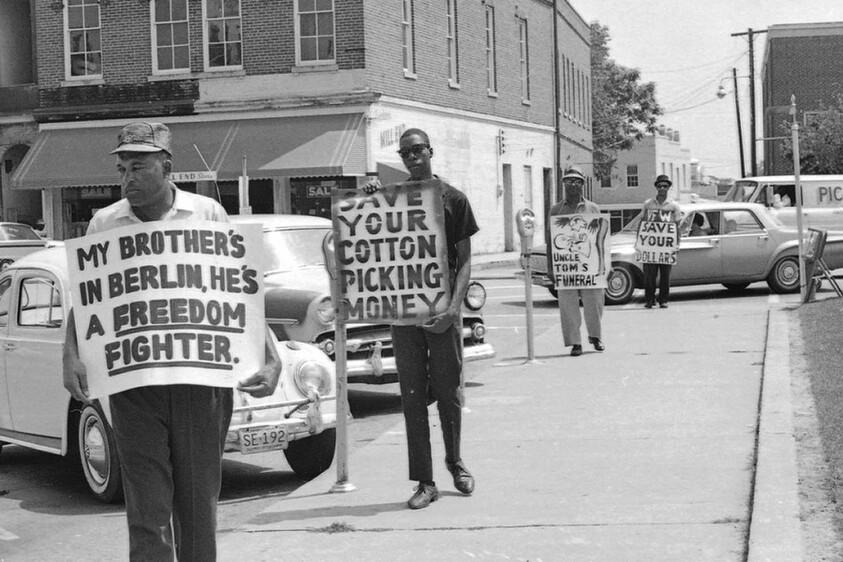 During the summer of 1960, the elders of Orangeburg
took to the streets as part of ongoing demonstrations and
boycotts in support of civil rights. They are standing
outside a segregated supermarket where they were
allowed to shop but not sit down for lunch