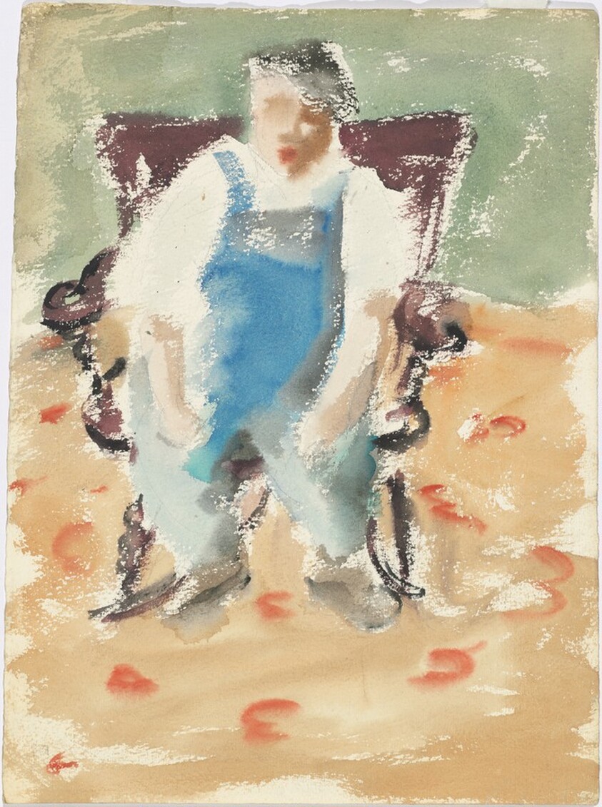 Man Wearing Overalls and Hat Sitting in a Rocking Chair