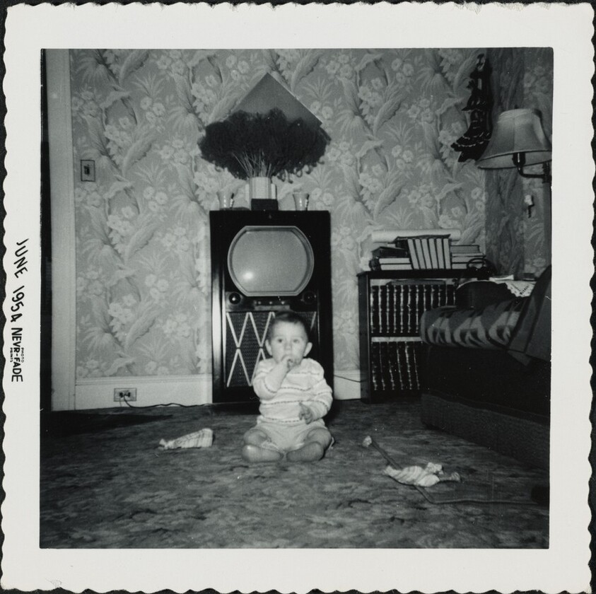 Untitled (Baby in front of television)