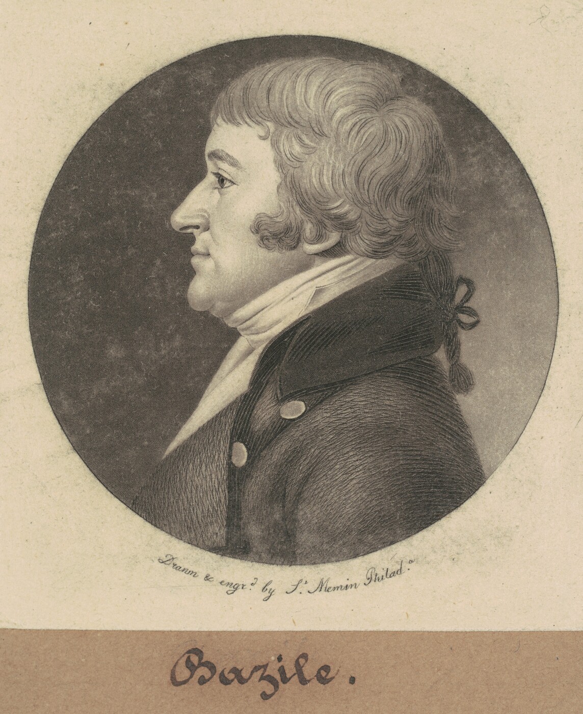The image shows an illustration of a man in a side profile. The man has a prominent nose, a strong chin, and wavy hair that extends to his nape. He is wearing a dark jacket with a high collar, buttons, and a cravat or scarf around his neck. The background is a simple circular frame with a solid, dark color. At the bottom, the text displays the name "Bazile."