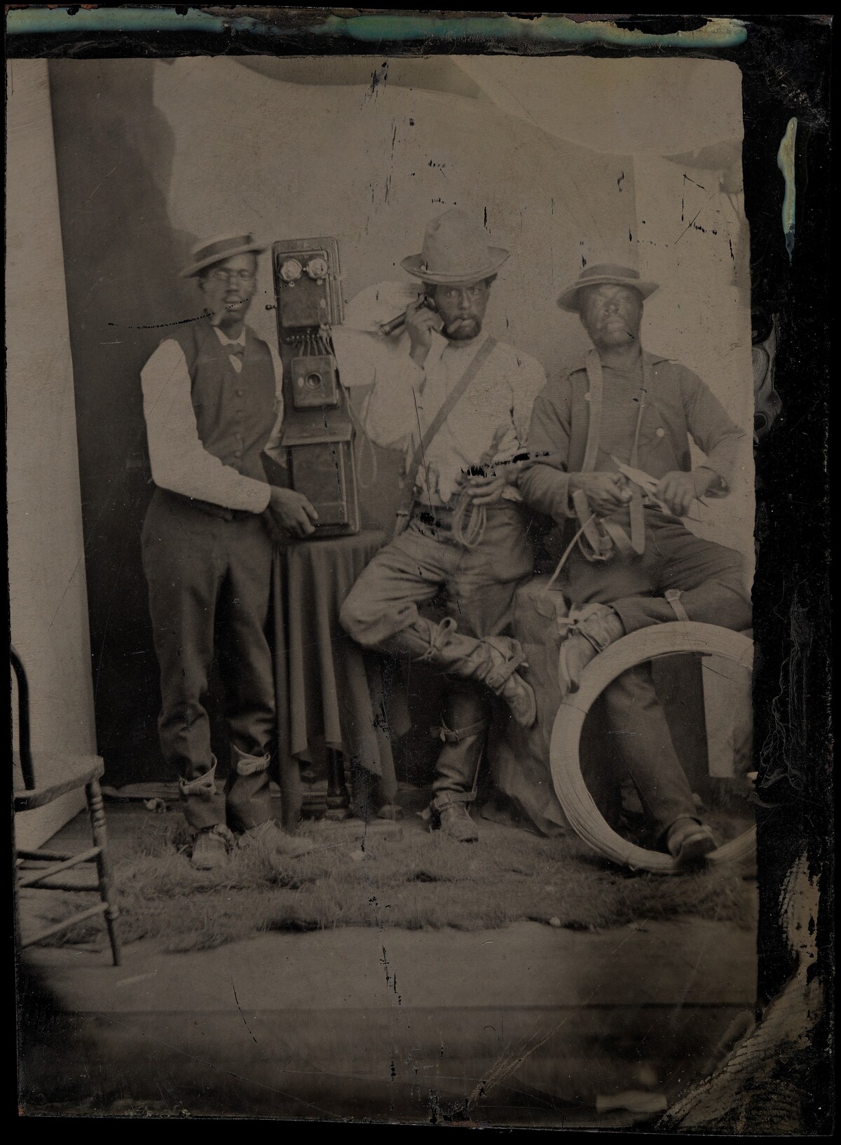 Portrait of Men with Telephone Equipment