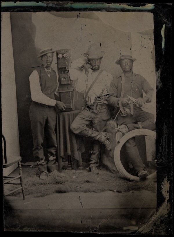 Portrait of Men with Telephone Equipment