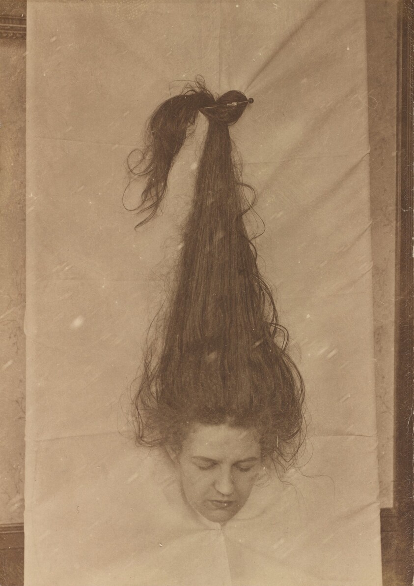 Untitled (Woman with head through sheet)