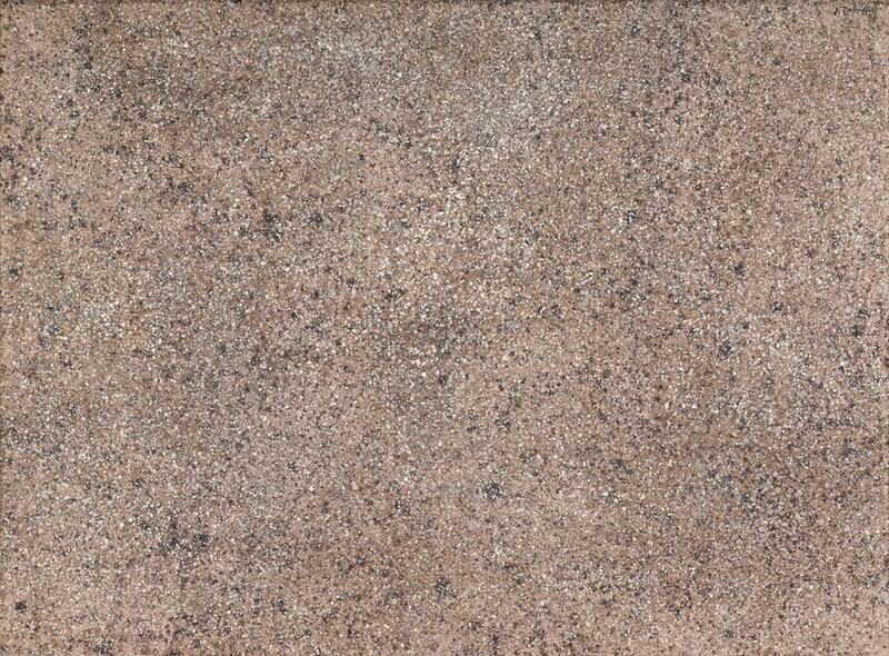 Grain-like speckles and dots in shades of sand brown, cream white, smoke gray, and soft black are evenly distributed across the horizontal surface of this abstract painting. The artist signed and dated the upper right corner, "J. Dubuffett '58."