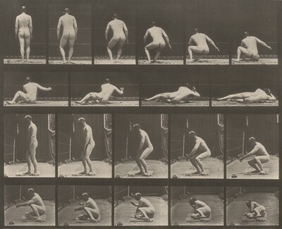 The image displays a series of photographs showing a nude male figure transitioning from standing to crouching and eventually lying on the ground. The man's body is visible entirely in each frame, showcasing different angles and stages of movement. He is bald and his facial features are not distinctly visible in all frames. There are no clothes or accessories visible on the person. The background includes what seems to be a wire mesh and solid vertical surfaces, possibly a part of a fenced or enclosed area, with light filtering through and casting shadows on the ground.