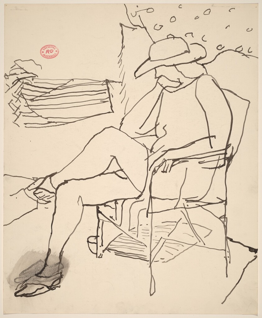 Untitled [woman in a hat seated in a garden]