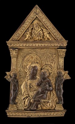 The sculpture shows a seated figure holding a child, surrounded by two smaller winged figures. The subject is central with a prominent position in the composition, flanked by columns. The sculpture is crafted in a gold color, possibly a metal like brass or gilded. The figure at the top of the triangular pediment appears to be holding a scroll, flanked by two small figures. The sculpture features detailed patterns etched into the background and framework, including repeated geometric designs and motifs. The expression and posture of the figures suggest a calm and composed arrangement.