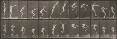 This is a photograph of a sequence showing a person in motion. The image captures a series of photographic frames depicting the detailed motion of a figure engaged in a physical action, set against the backdrop of a gridded wall. Each frame in the sequence highlights different stages of the leap, documenting the bodily dynamics and postures from various angles.