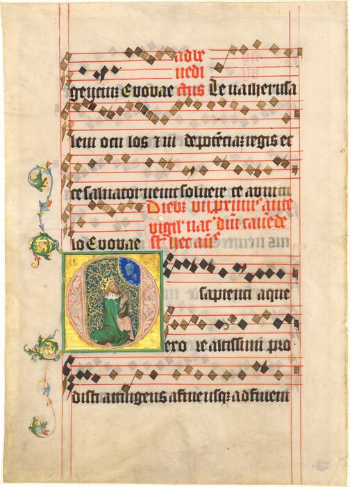 This is a painting of an illuminated manuscript page with musical notation. The page features text in Latin with musical notation in black ink on red-ruled staves. The text includes decorative initials in red, and a large ornate initial "L" in the lower portion of the page with a detailed miniature of a figure in a green robe within a gilded background with floral designs. The left margin is adorned with vine-like decorations with foliage and circular motifs.