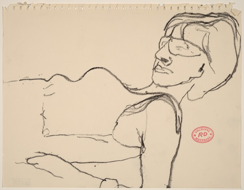 Untitled [woman reclining in glasses]