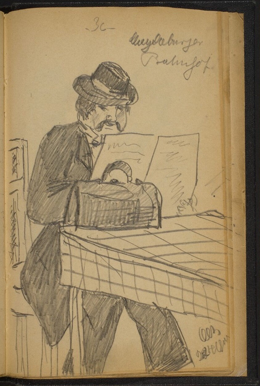 Man with His Briefcase Seated at a Table