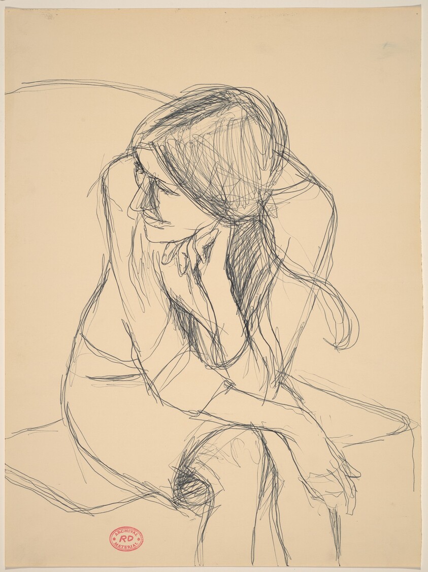 Untitled [seated woman leaning forward and turning her head]