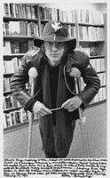 Oliver Ray, aspiring writer, adept at word processors, one time archivist in Francesco Clemente's Manhattan studio, recent Calvin Klein ad model, drove from N.Y. to Ann Arbor to attend Patti Smith & myself at Buddhist money benefit performance- limping from legs broken in fall off Mexican Ocean Cliffside one night months before. -- here in Shaman Drum store for Patti Smith's _Early Work_ book signing, February 17, 1995, Allen Ginsberg, 1995