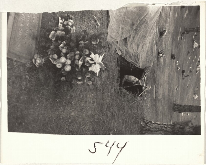 Workmen digging grave, Forest Lawn--Los Angeles
