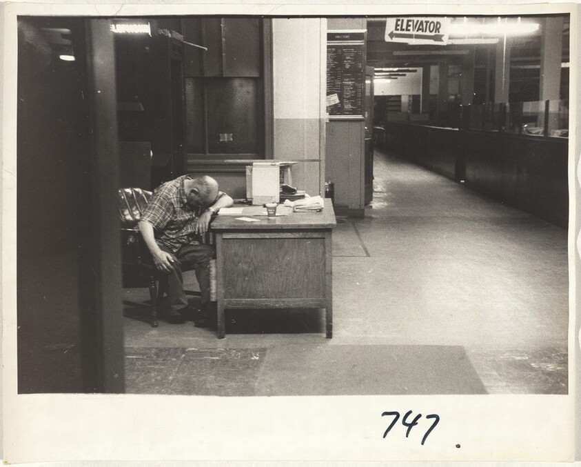Man asleep at desk--Indianapolis