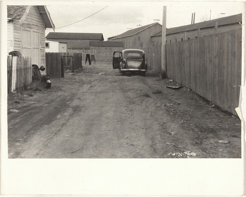 Car in alley--Butte, Montana