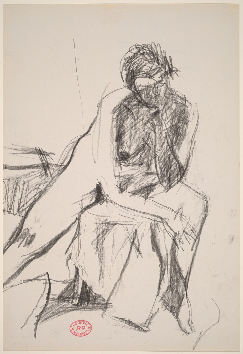 Untitled [seated female nude leaning on left arm]