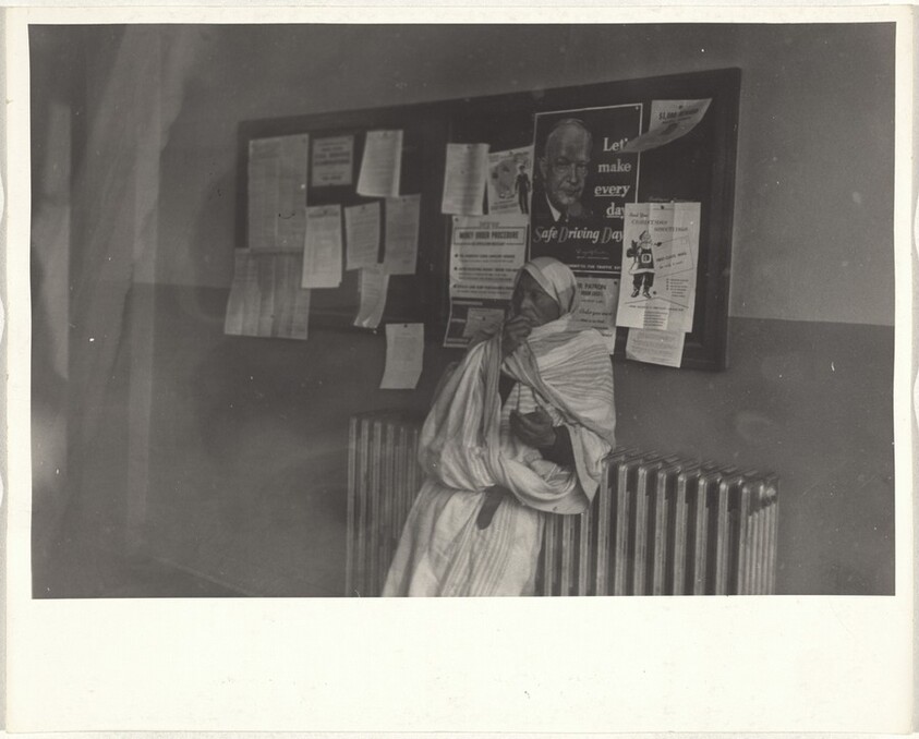 Elderly person leaning on radiator--New Mexico