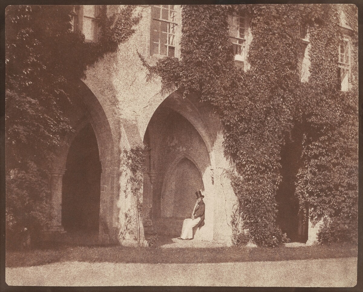 The Reverend Calvert Jones in the Cloisters at Lacock Abbey
