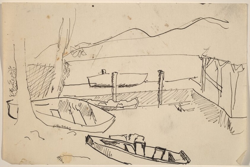 Boats on Shore and Docked at a Pier