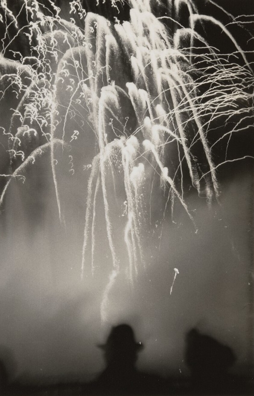 Untitled (Silhouette of couple watching fireworks)