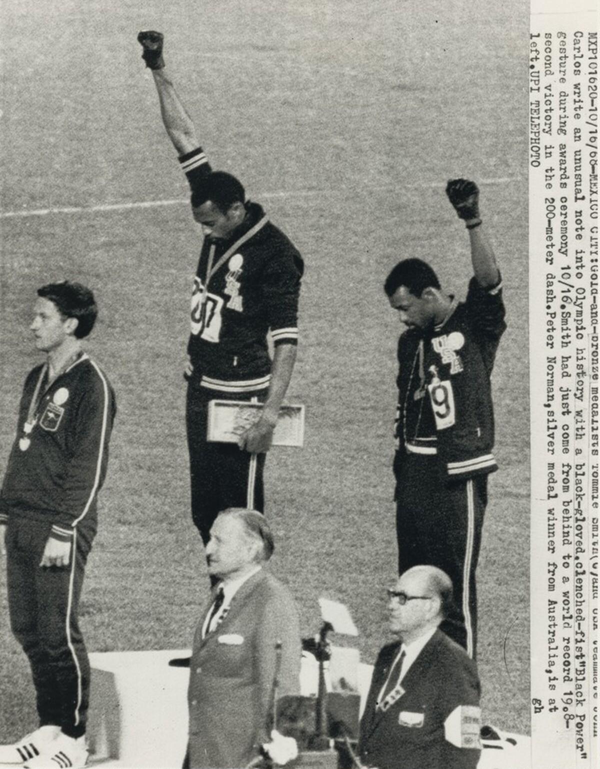 Title from caption on object: “Gold-And-Bronze Medalists Tommie Smith and USA Teammate John Carlos...”