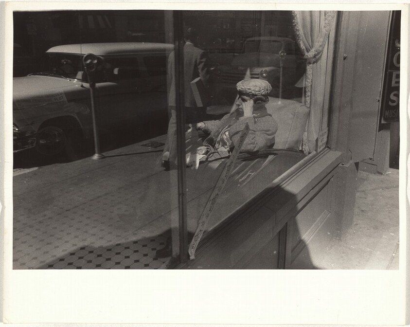 Woman in window--San Francisco