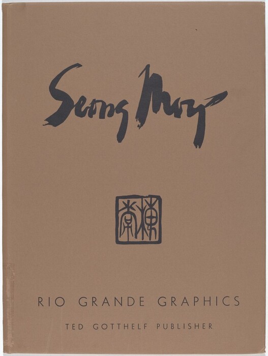 This is a photograph of a book cover. It is predominantly brown and features the text "Seong Moy" in an artistic script at the top center. Below it, there is an abstract, square black graphic resembling tribal symbols, and at the bottom, there is structured text reading "RIO GRANDE GRAPHICS" and "TED GOTTHELF PUBLISHER" in a serif font. The overall design suggests a minimalist aesthetic with an emphasis on calligraphy and symbolic representation.
