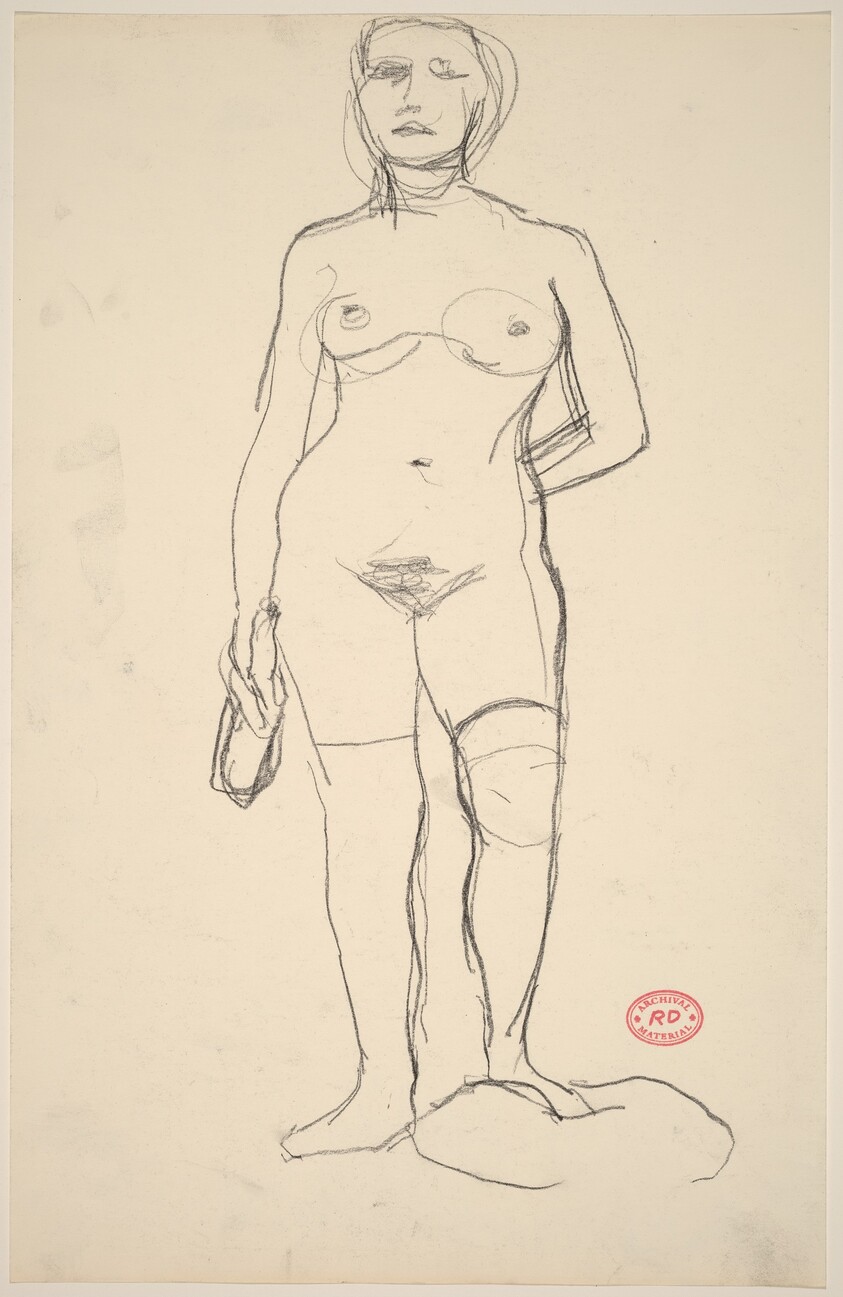 Untitled [standing female nude holding a bottle]