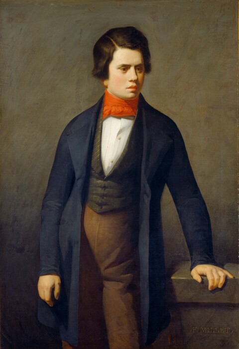 Shown from the knees up, a pale-skinned, clean-shaven man stands looking off to our right in this vertical portrait painting. The man’s body is squared to us, but he turns his head to the right and looks down in that direction with brown eyes. He has a wide-bridged nose, full lips, and a rounded chin. His cheekbone-length brown hair is parted to the side and brushed straight over his ears. His tomato-red cravat is tied high around his neck over a white shirt and an olive-green vest patterned with a gold-colored grid. His navy-blue coat falls almost to his knees, and he wears brown pants. The stone ledge comes almost to hip height, and the man leans onto his left hand, to our right, braced near its front ledge. The ledge and background are flint gray deepening to iron gray along the bottom edge. The artist signed the painting as if his name was carved into the front face of the ledge: “F. MILLET.”