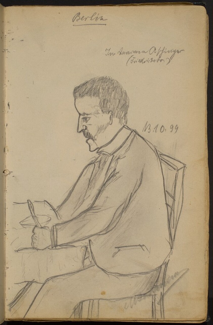 Man Seated at a Dining Table