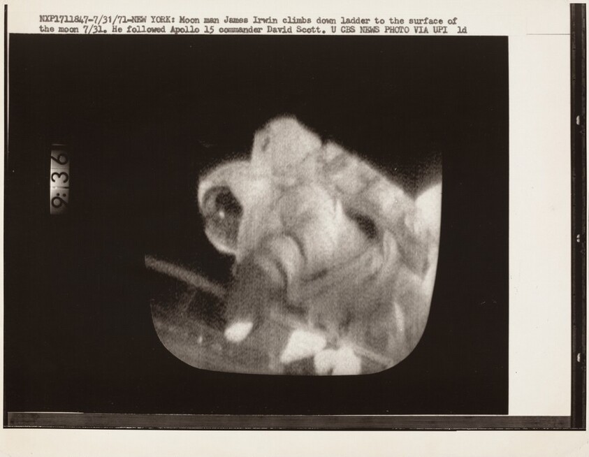 Title from caption on object: "Moon Man James Irwin Climbs Down Ladder...”