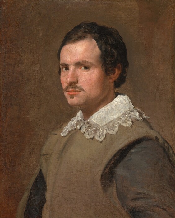 Shown from the chest up, a pale-skinned young man with dark hair and a brown mustache and goatee looks at us from the corners of his dark eyes in this vertical portrait painting. His body and face are angled to our left, and his left eyebrow, closer to us, is slightly cocked while other is low over his other eye. He has a straight nose, a square jaw, and his pink lips are closed. His short, brown hair lays flat against his head but curls around the ear we can see. He wears a pecan-brown vest over a black, long-sleeved shirt with a white, lace-edged collar at the neck. His garments blend into the peanut-brown background so the light falling from the upper left highlights his features and white collar.