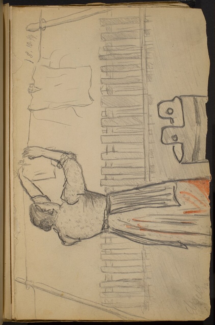 Woman Hanging Clothes on a Line