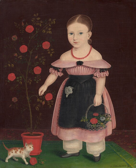 A young girl stands facing us next to a tall, stylized plant, perhaps a rose bush, in this vertical portrait painting. Looking at us with blue eyes, she has light, peachy skin, and her brown hair is parted down the middle and pulled back. Her shoulders are bare, and she wears a coral-red bead necklace. The dress flares out where it encircles her upper arms above short ruffled sleeves. A black apron is tied around her waist and falls to about her knees. The skirt of the dress is longer, falling to midcalf, and wide, white petticoats extend like pant legs below to white stockinged feet in black shoes. A white, lace-trimmed handkerchief is tucked into her apron, and she wears a black brooch at her chest. She holds a gray glass basket in her left hand, our right, filled with two red roses, a blue flower, and green leaves. With one hand, she touches a stem on the rose bush, which is planted in a red pot. One flower has fallen to the floor next to a brown and white cat, perhaps a kitten, in the lower left corner of the painting. The girl and cat stand on an emerald-green carpet, the edge of which runs from the lower right corner of the canvas toward the back of the darkened room.