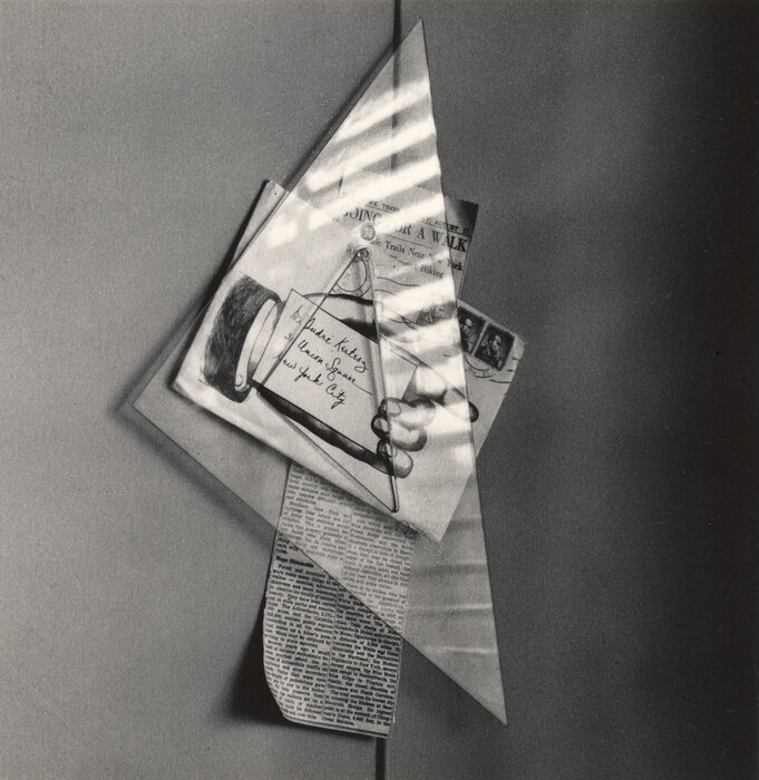 The image consists of overlapping triangular and rectangular shapes arranged in a dynamic configuration. One shape appears to be a piece of paper with text, while another shows an illustration of a hand holding a bottle. The elements resemble a collage, similar to pages from a newspaper or a scrapbook. Shadows and overlapping angles add depth to the layered appearance of the image.