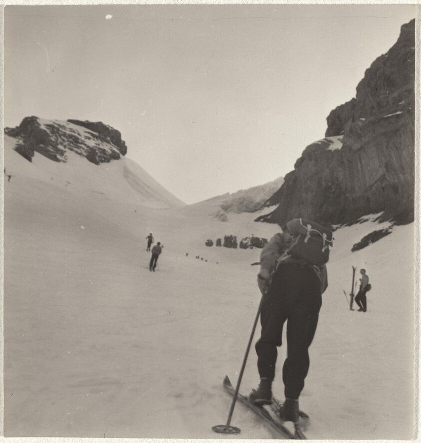 Skier climbing hill--Sports