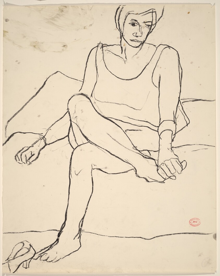 Untitled [seated woman holding her foot]