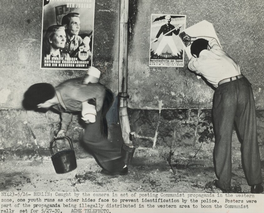 Title from caption on object: “Caught by the Camera in Act of Posting Communist Propaganda...”