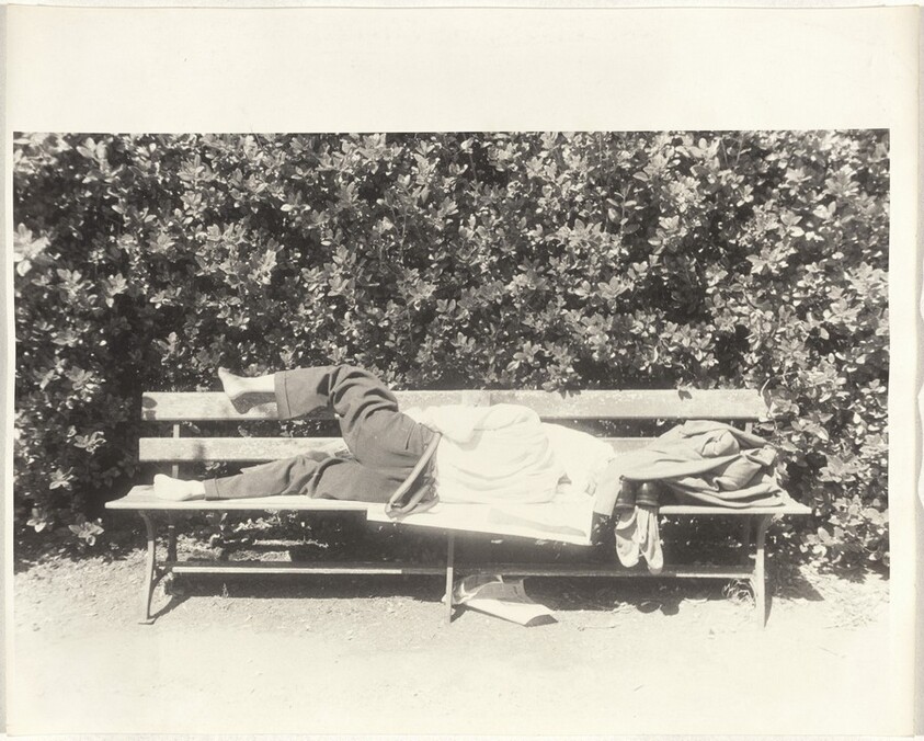 Man asleep on park bench--San Francisco