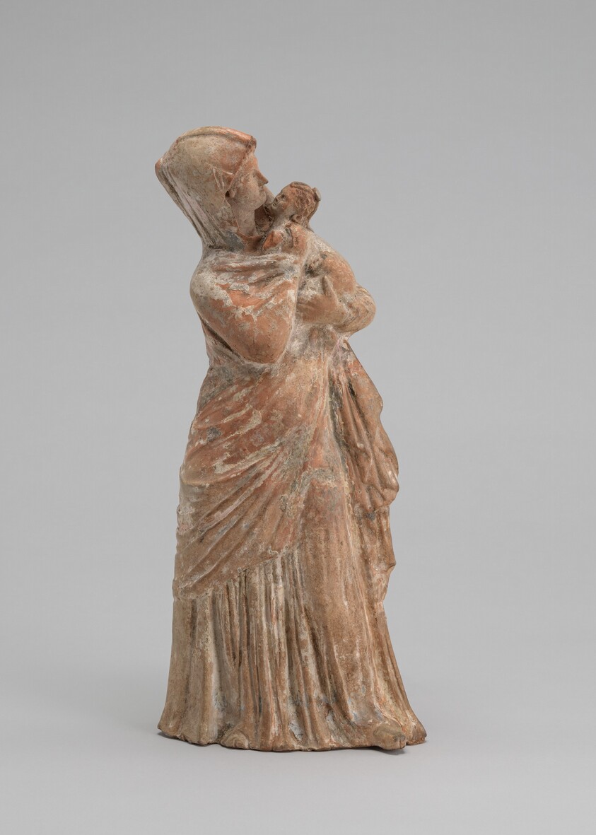 Woman with a Baby in her Arms