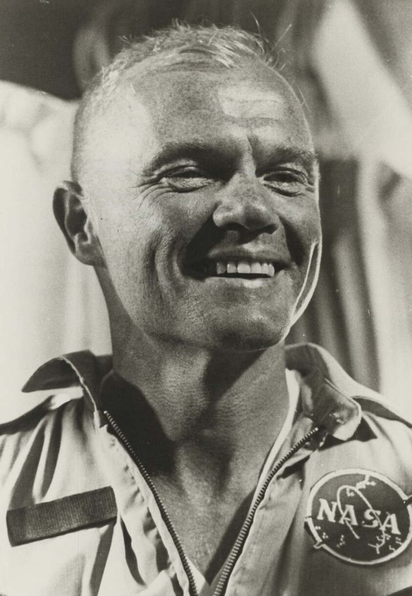 Title from caption on object: “Astronaut John Glenn Smiles Happily...”