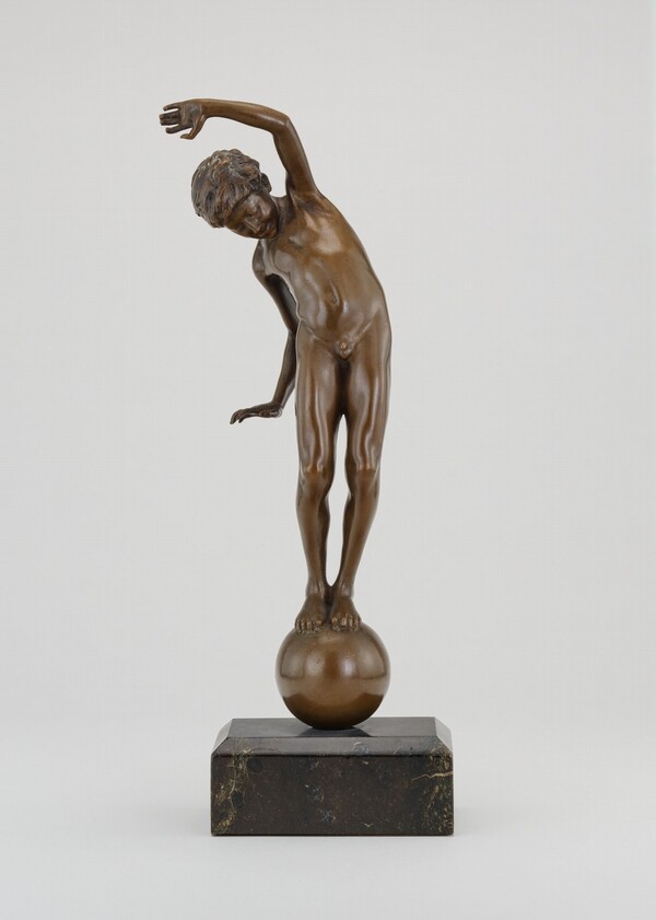 Boy Balancing on a Ball