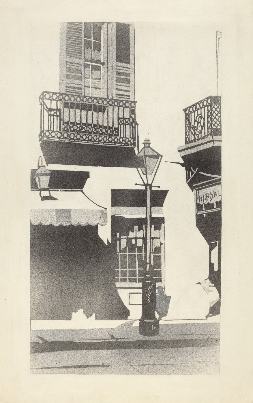 The image shows a building's façade at an angle, capturing balconies, a streetlamp, and architectural details. The horizon is not visible, focusing closely on the building's elements. The balconies, with wrought iron railings, are at the top, a streetlight is in the middle beside a store's awning. The brushstrokes are distinct, using a stippling technique for various shades against a lighter background. The color palette is black, white, and grey with stark contrast highlighting details. In the distance, there are suggestions of a street and the lower part of the building.