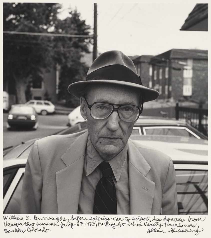 William S. Burroughs, before entering car to airport, his departure from Naropa that summer July 27, 1985, Parking lot behind Varsity Townhouses, Boulder Colorado.