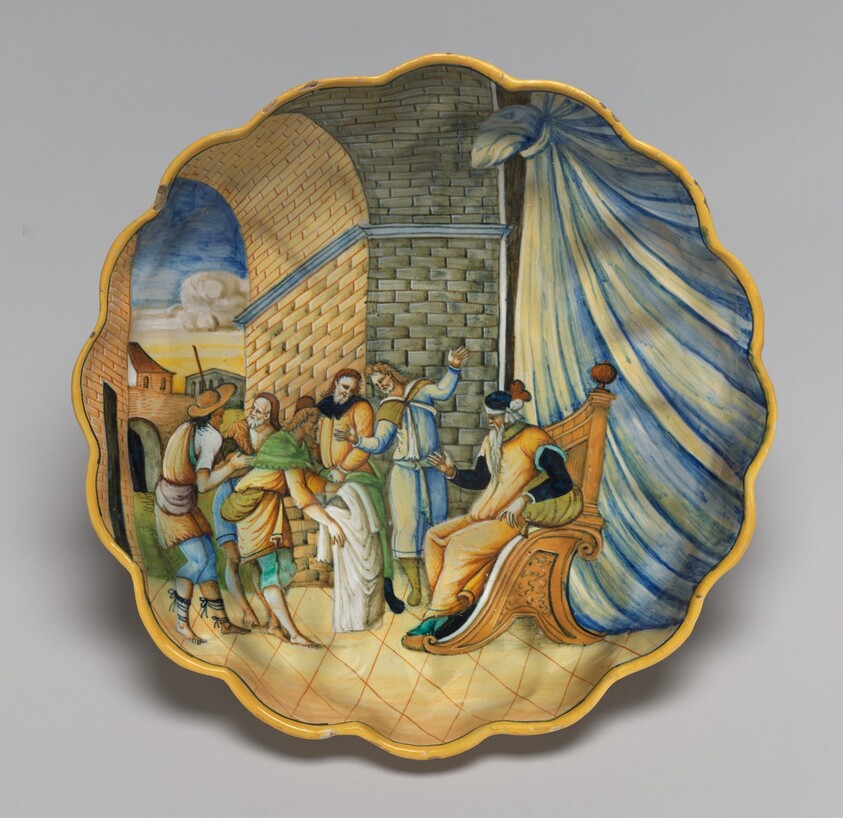 Molded dish with Joseph's robe being presented to his father
